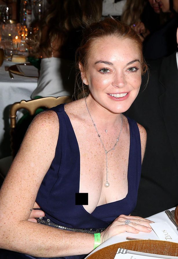 Lindsay Lohan Suffers Embarrassing Wardrobe Malfunction And Exposes Modesty For All To See