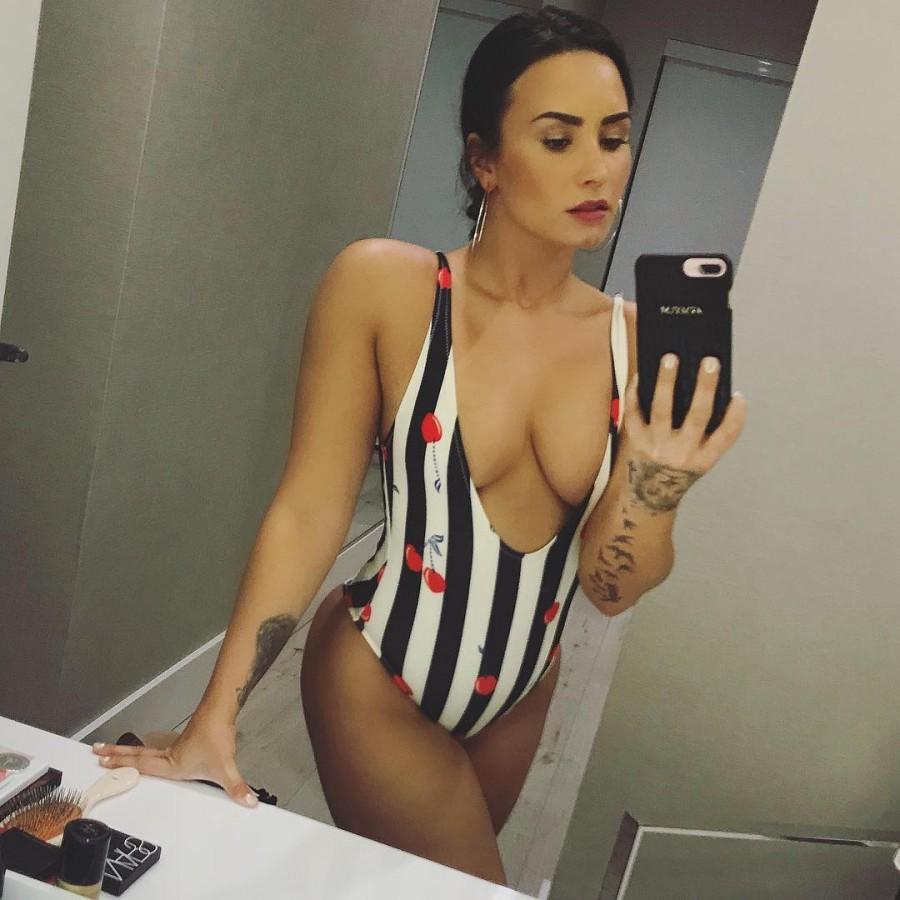 Demi Lovato Flashes Peachy Bottom As She Struggles To Contain Assets In